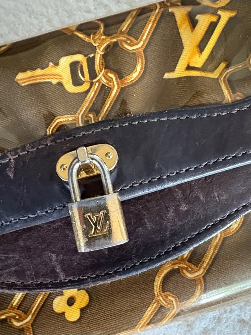 Louis Vuitton Monogram Charms Porte-Monnaie Wallet in brown (7.5 x 4in.)